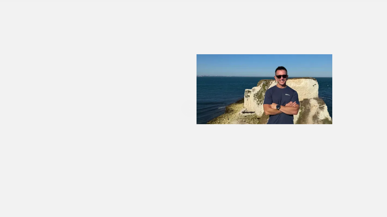 Screenshot of Behavioral Scientist Dean Grey's website, featuring his research on attention pressure and strategies for focus.