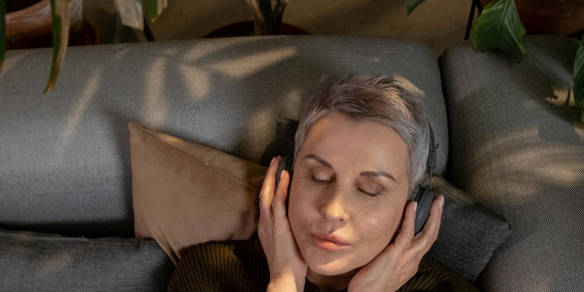 A person visibly relaxing, illustrating the physical release of tension from anxiety.