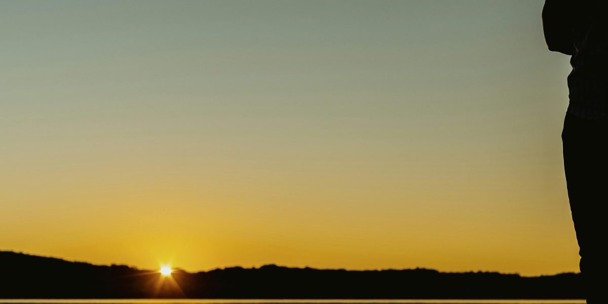 A person beginning their day with focus and peace, reflecting lasting benefits of meditation.