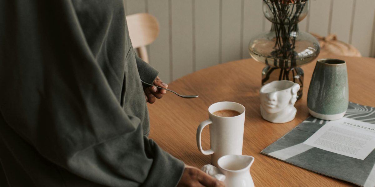 Someone finding a quiet moment to practice self-care, demonstrating how breathing can fit into a daily routine.