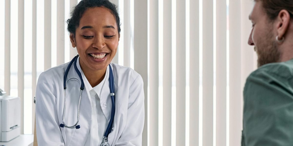 A patient discussing health concerns with a medical professional, emphasizing the importance of expert advice.