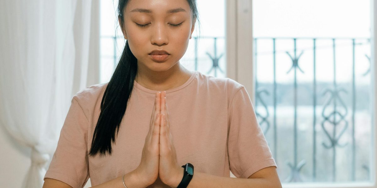 A person transitioning from a state of stress to a moment of calm and composure.