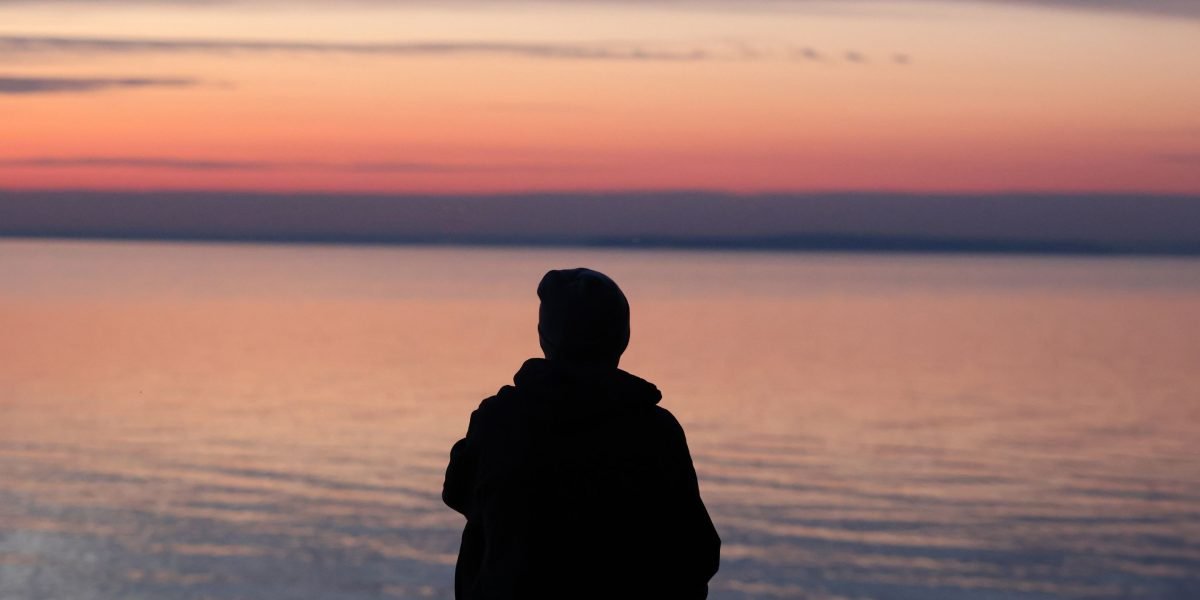 A person finding a moment of calm through focused breathing, illustrating the immediate impact of simple exercises.