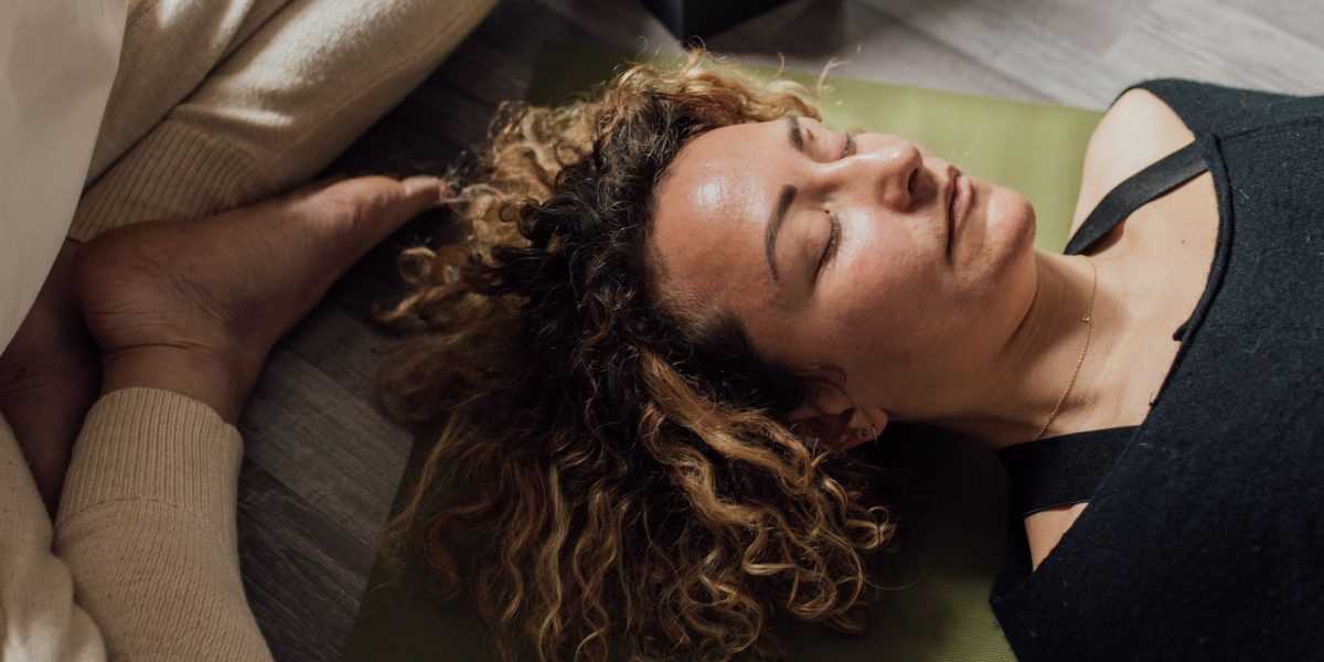 An individual engaged in mindful breathing, demonstrating the focus required for tempo breathing.