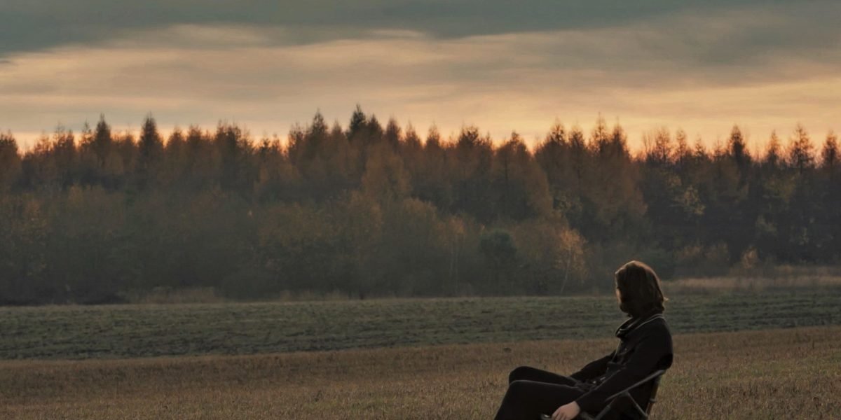 A person in a quiet, reflective moment, contemplating their feelings of disconnection.