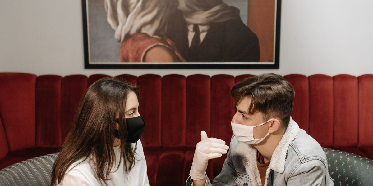 A couple experiencing distance in their communication, illustrating the impact of withdrawal.