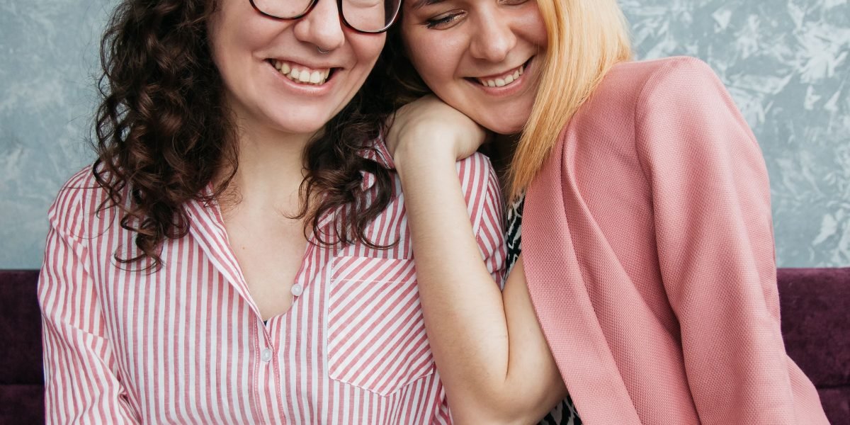 Showing compassion and support during a friend's difficult moment in a public setting.
